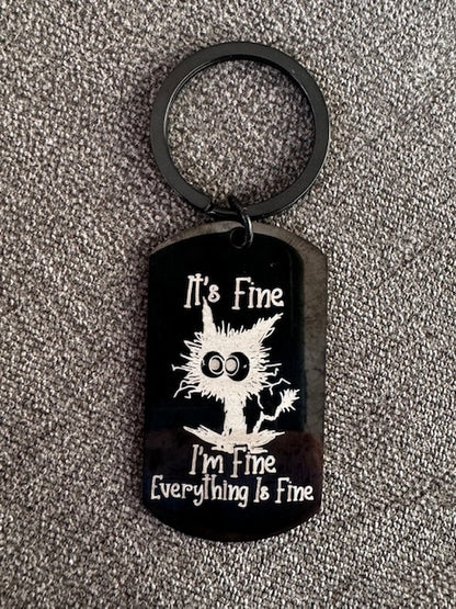 I'm fine - Everything is fine Black oblong keyring with spooked cat
